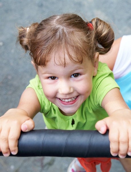 Girl playing on equipment